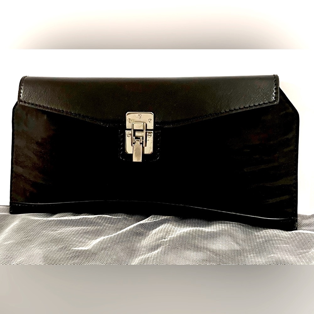 VBH First Edition Black Pony Clutch - RARE
Slim Clip Shiny Black Cavallino